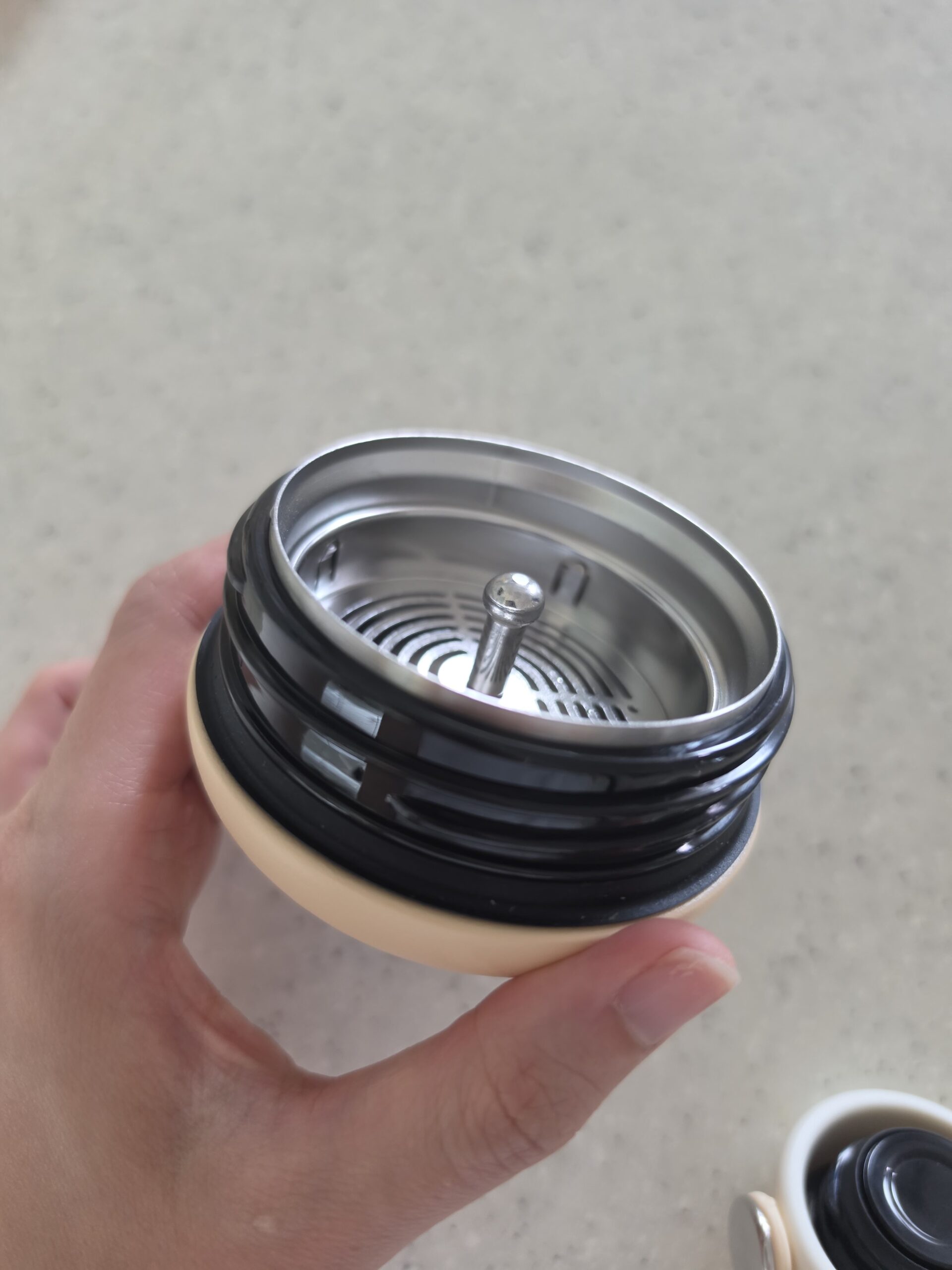 ONEL Bottle wide cap flipped over showing rubber gasket seal
